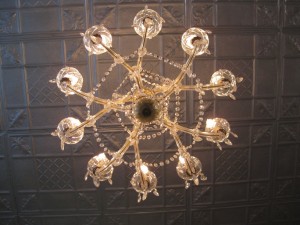 The antique tin ceiling reportably came from an old steamship.